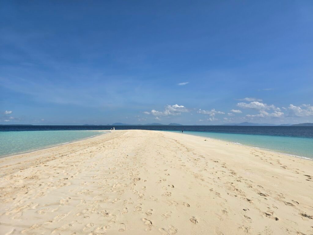 White sand bar beach at Sibaun Island in the Tun Sakaran marine park Semporna