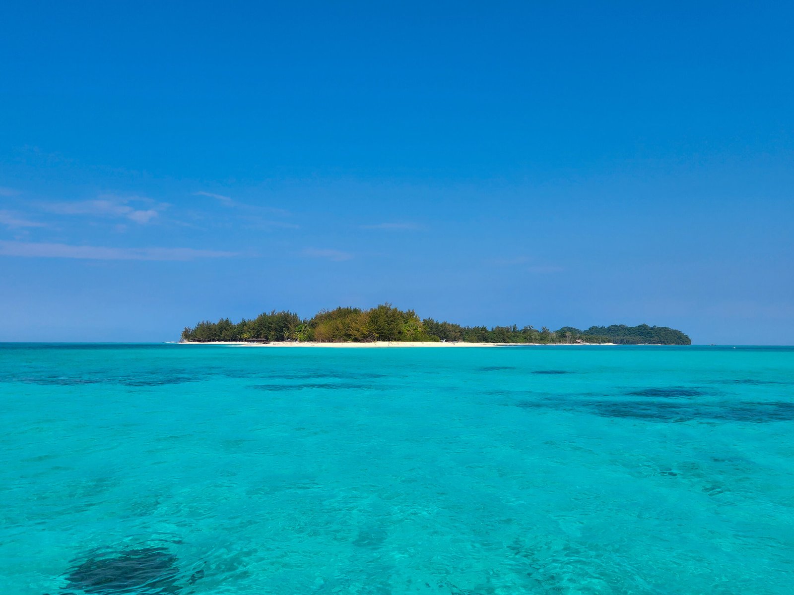 Island hopping and snorkeling in Sabah at Mantanani Island, Kota Belud