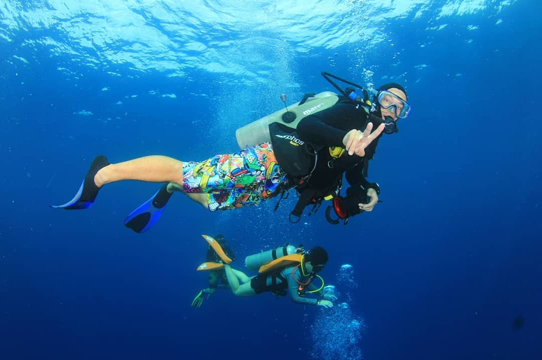 Guiding divers during PADI Dive Master course in Sabah