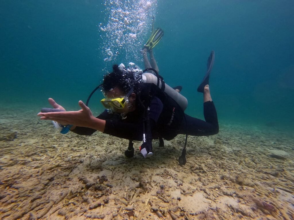 Practising skills during PADI Specialty Peak performance bouyancy training dive